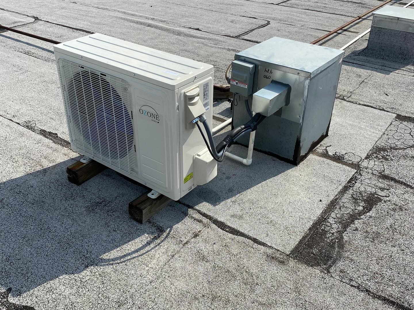 Lennox HVAC unit installation on residential roof